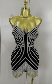 Gianna shiny diamond chain strapless bodycon mini dress. Sexy luxury outfit for birthdays, club nights, and evening party events.