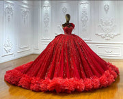 Ruby red sparkle princess gown with crystal bodice and ruffled hemline.