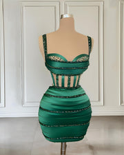 Mannequin Wearing a Green Beaded Sweetheart Cocktail Birthday Dress with Intricate Embellishments and a Flattering Silhouette, Styled for Luxe Celebrations
