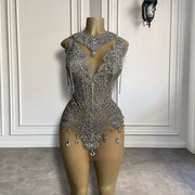Mannequin Wearing a Luxury Silver Crystals Sexy See Through Birthday Dress with Sparkling Embellishments and Sheer Mesh Panels, Styled for Glamorous Celebrations
