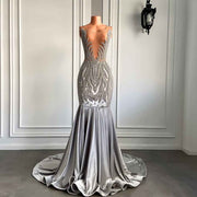 Sexy Sheer Sparkly Prom Dress with Diamond Accents in Silver