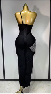 Cindy bandage dress with an asymmetric slanted collar and silver tassel fringe in a bodycon mini silhouette.