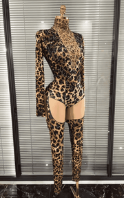 Azi leopard print rhinestone two piece performance outfit for women. Sexy clubwear for stage, DJ sets, and nightlife events.