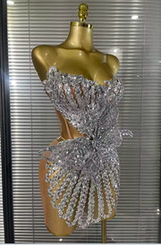 Gabrielle strapless sheer mesh mini dress featuring sparkling crystal embellishments and lace-up detailing