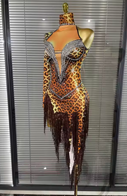 Carmela one-shoulder bodycon midi dress featuring sparkling rhinestones and decorative tassel details