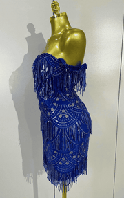 Linda blue off shoulder sequin tassel bodycon dress for women. Sparkly party outfit for birthdays, nightclub, and evening events.