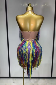 Tabia backless luxury bodysuit encrusted with sparkly rhinestones and long tassels for a glamorous birthday or stage outfit.