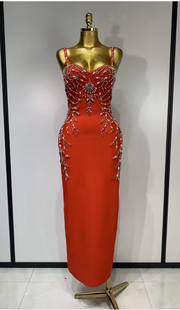 Sasha black bandage maxi dress with a deep V-neckline and hand-sewn black beadwork in a bodycon long silhouette.