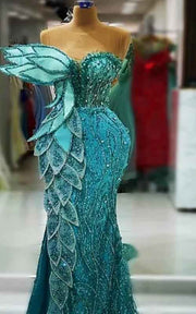 Azure Leaf Sculptural Mermaid Gown With Iridescent Beading And Tiered Petal Bodice