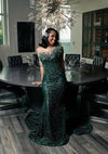 Green glitter beaded rhinestone mermaid prom dress with shimmering details.