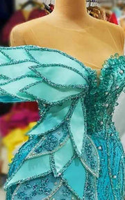 Azure Leaf Sculptural Mermaid Gown With Iridescent Beading And Tiered Petal Bodice