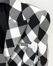 women’s blazer in black and white checkered pattern with buckle