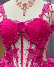 Hot pink corset bodice 3D floral ball gown quinceañera dress with sheer illusion panel and ruffle hem