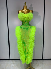 Luxury rhinestone strapless two-piece outfit with sparkly crop top and skirt for party or stage wear.