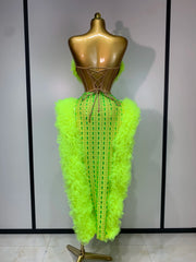 Luxury rhinestone strapless two-piece outfit with sparkly crop top and skirt for party or stage wear.