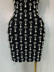Strapless pearl and rhinestone bodycon mini dress with backless design