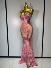 Kalia strapless bodycon mini dress encrusted with sparkly rhinestones and sequins for a luxury birthday outfit.