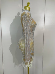 Brenda short mesh dress with pearls and sparkling diamond details for elegant party wear.