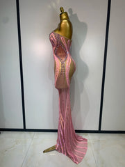 Kalia strapless bodycon mini dress encrusted with sparkly rhinestones and sequins for a luxury birthday outfit.