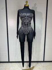 Audre luxury rhinestone stretch jumpsuit with shimmering rhinestones and fitted silhouette.