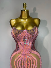 Kalia strapless bodycon mini dress encrusted with sparkly rhinestones and sequins for a luxury birthday outfit.