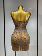 Cassandra sleeveless rhinestone bodycon mini dress for women. Sexy sparkly outfit for birthdays, nightlife, and stage wear.