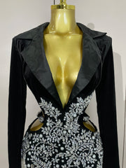 Naomi black hollow-out mini dress with diamond accents and tassels for women’s evening parties, birthdays, or stage events.