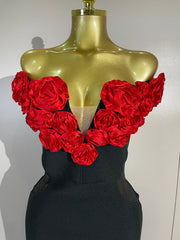 Astrid red off-shoulder bandage maxi dress featuring dimensional 3D floral embellishments and a fitted bodycon silhouette