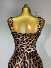 Jamila sleeveless leopard print bodycon mini dress with a form-fitting silhouette for a sexy party look.