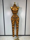 Sparkly rhinestone tiger pattern tight fitting jumpsuit for women, luxury party and stage outfit.