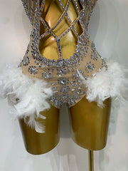 Blair Starlight feather bodysuit with glamorous feathers and shimmering details.