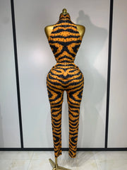 Sparkly rhinestone tiger pattern tight fitting jumpsuit for women, luxury party and stage outfit.