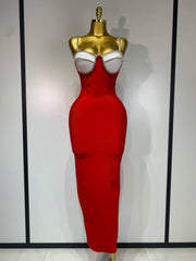 Red backless bodycon maxi dress with diamond embellishments.