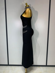 Gwen sleeveless bandage dress in a bodycon fit featuring luxury diamond crystal embellishments and a sculpted silhouette.