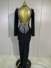 Maggie black rhinestone bandage maxi dress with long sleeves, a backless design, and a figure-hugging bodycon silhouette