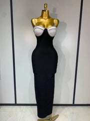 Red backless bodycon maxi dress with diamond embellishments.