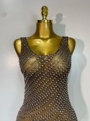 Shine in the Daisy sparkly rhinestone sheer bodycon mini dress. Luxury party dress for birthdays, cocktail parties, and special occasions.