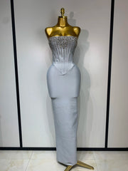 Jasmine strapless grey bandage dress with beading details and backless design for evening parties.