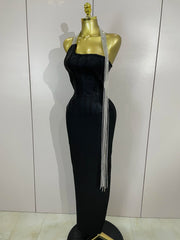 Black strapless bodycon bandage dress with sparkly diamond embellishments and tassel details for women’s party and birthday wear.