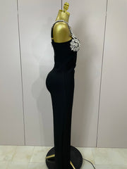 Kaylani wearing a shining diamonds V neck sleeveless jumpsuit with sparkling rhinestone details.