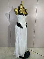 Betty pearl sequin halter bandage maxi dress featuring intricate beading and a glamorous figure-hugging silhouette