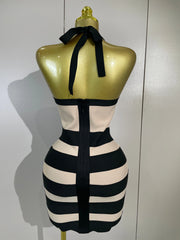 Azi sleeveless halter backless bandage mini dress with a figure-hugging bodycon silhouette