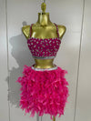 Margie two-piece party set featuring a beaded crop top and feather skirt for a glamorous statement look