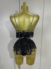 Claire rhinestone feather tassel mesh bodysuit for women. Sexy performance outfit for nightlife, dance, and stage events.