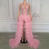 Tiana pink sheer rhinestone prom dress with deep V-neck and sparkling details.