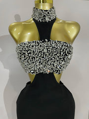 Shine in the Rhian black crystal rhinestone backless bodycon bandage dress. Elegant party dress for birthdays, cocktails, and evening events.