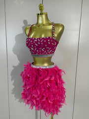 Margie two-piece party set featuring a beaded crop top and feather skirt for a glamorous statement look