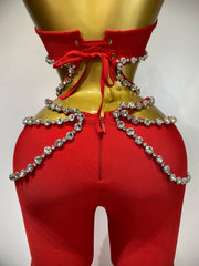 Stand out in the Meghan red rhinestone cut-out bandage pants set. Sexy two-piece outfit for birthdays, parties, clubs, and special occasions.