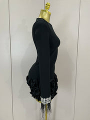 Nicole shiny diamond feather long-sleeve bodycon dress with sparkling crystals and elegant feather cuffs.