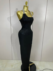 Black strapless bodycon bandage dress with sparkly diamond embellishments and tassel details for women’s party and birthday wear.